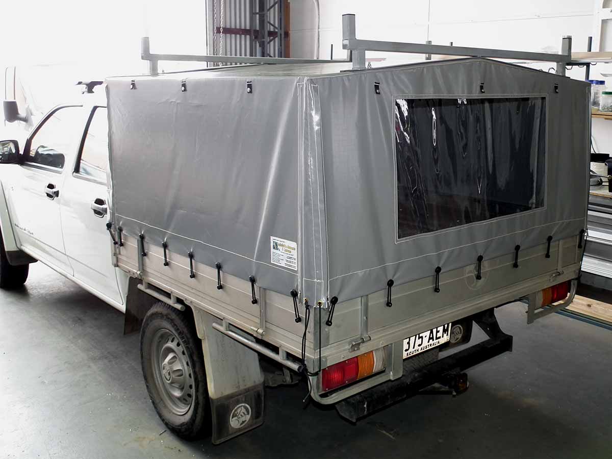 Dual Cab Ute Canopy showing clear windows and ladder racks